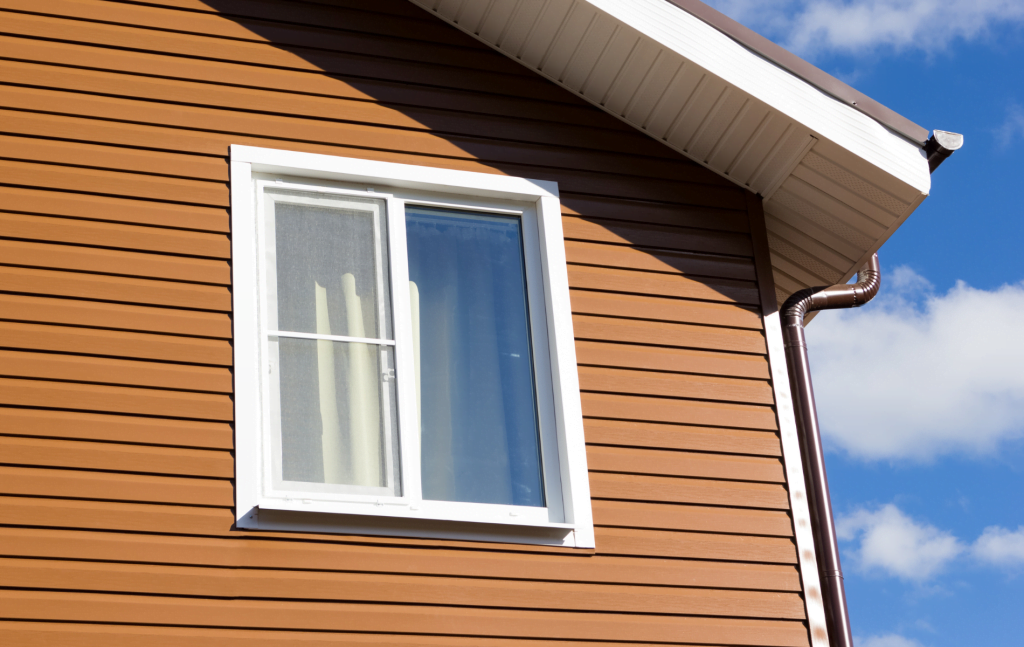 NEPA home with trendy brown siding color options provided by RNS Construction.