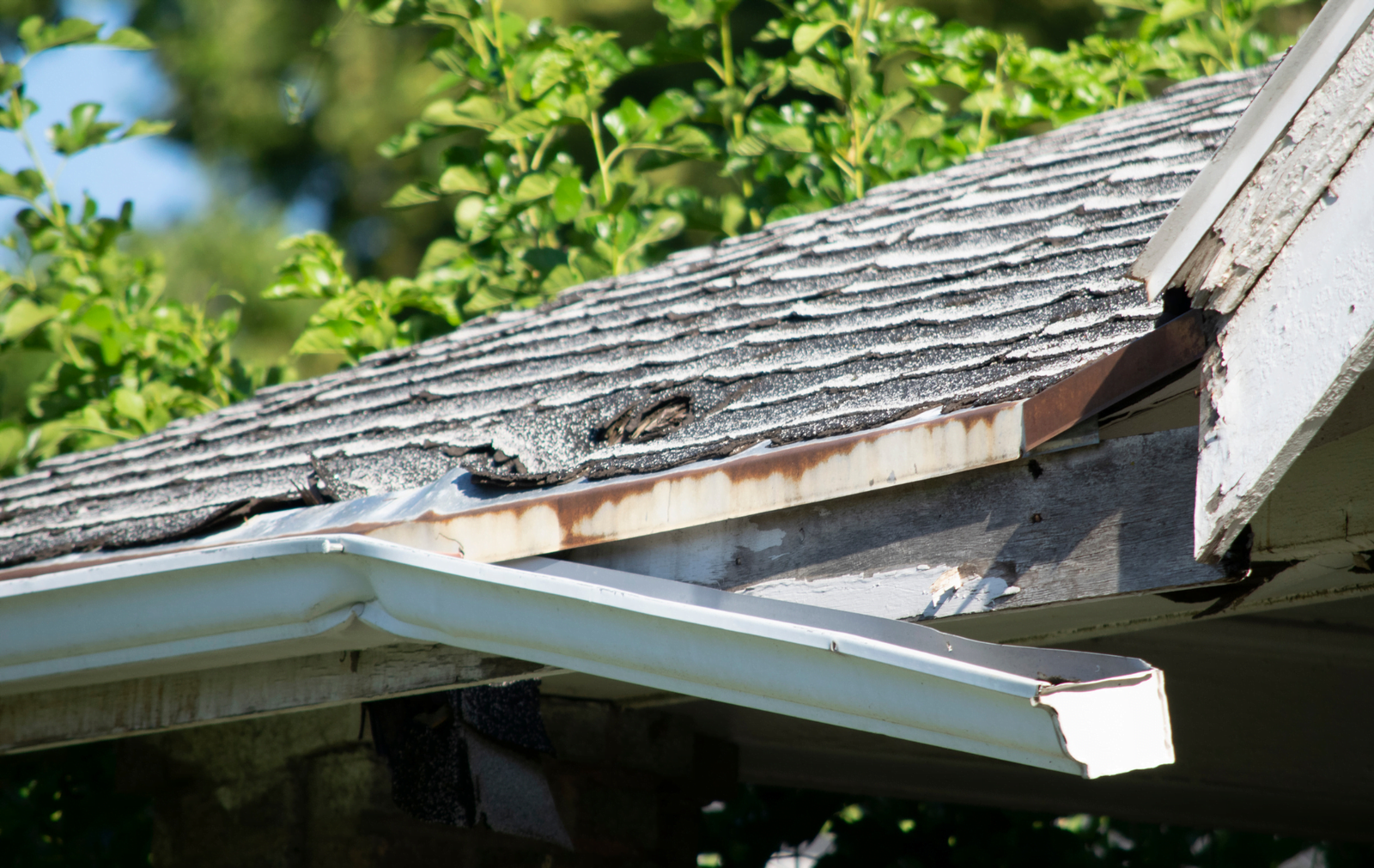 Roofing Repairs in NEPA 1 - rnsexteriors.com Home in NEPA showing urgent roof repair needs with visible signs of damage.