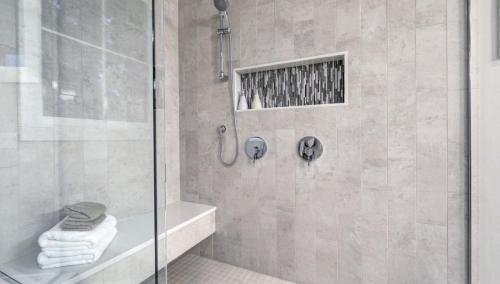 Sleek minimalist walk-in shower, small bathroom renovation in Scranton, PA.